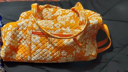 Orange luggage bag