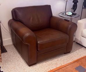 Large comfortable down filled leather club chair