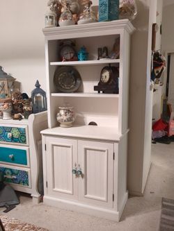 2 white shelves