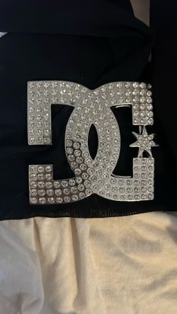 Dc belt buckle