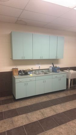 Upper and lower cabinets with sink