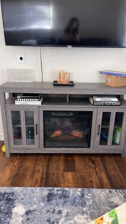 Beautiful fireplace that has heat and adjustable settings