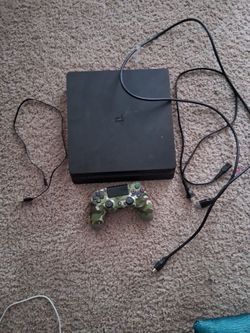 Playstation 4 slim with controller and cords