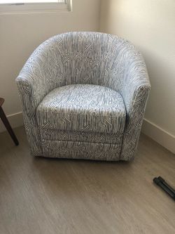Swivel arm chair