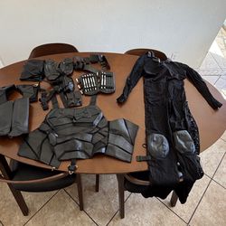 Realistic Batman 2022 suit with genuine leather could use some repairing though it has a rip on the crotch area