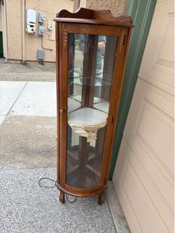 Corner curio cabinet