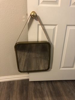 hanging mirror with leather strap
