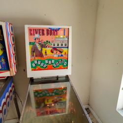 River Boat" pinball machine, manufactured by Williams Electronic Games, Inc. in September 1964. 