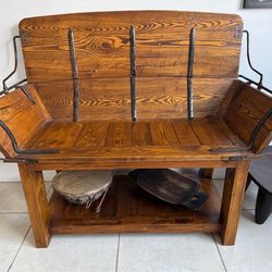 Vintage rustic handmade wooden and iron bench