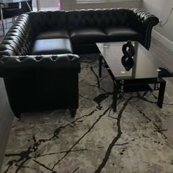 Faraaz Upholstered Faux Leather Chesterfield Sectional 