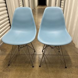 (2) Blue: Pair Of Eames Molded Fiberglass chair with wire base
