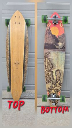 SUPER NICE! Globe Pinner CLASSIC 44" bamboo PINTAIL LONGBOARD featuring a natural bamboo grain deck, black side rails/dye, and a laser-etched/printed