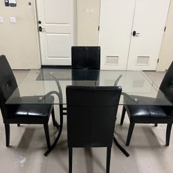 Dining Room Table With Four Black Chairs
