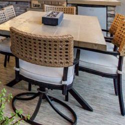 Outdoor dining set- 6 chairs , 2 swivel with center fire piece