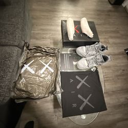 KAWS x Air Jordan 4 Retro Cool Grey