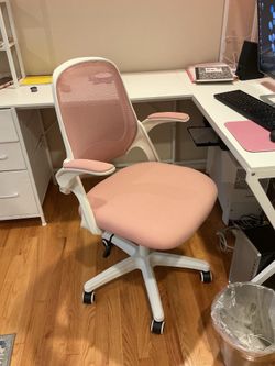 Brand new pink swivel chair