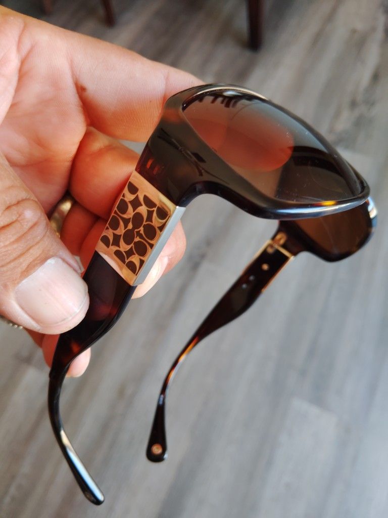 Lentes Coach
