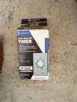 Intermatic FF12HC 12-hour mechanical spring-wound wall timer.