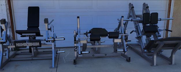 Hammer strength 3 piece plate loaded leg package. Hack squat leg curl leg extension