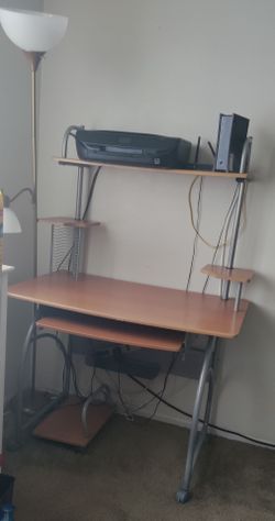 Computer desk with side holders and printer holder and key board