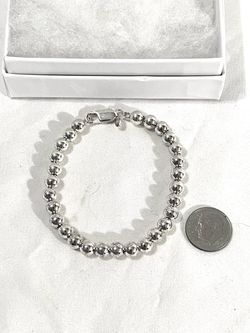 Brand new made in Italy 7 inch bead, strand, silver bracelet