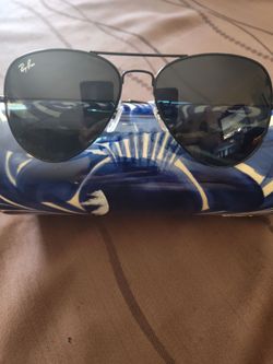 Ray bans, black tinted aviator sunglasses