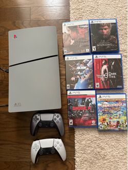 * read description * PS5 Slim Disc with 1TB WD SSD, games and controllers