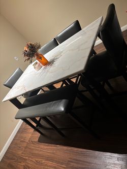 Dining table with 4 chairs and 1 bench