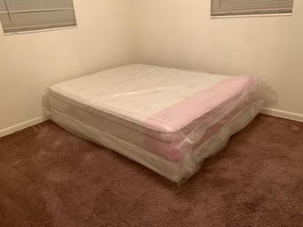 New queen mattress and box spring. 2 pc