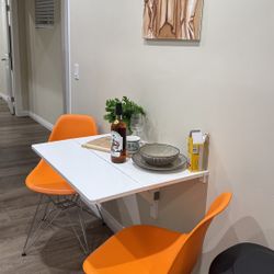 Orange Chairs And Black Chairs