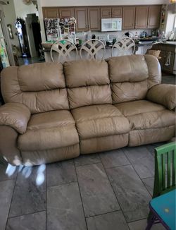 Two Brown Leather Reclining Couches