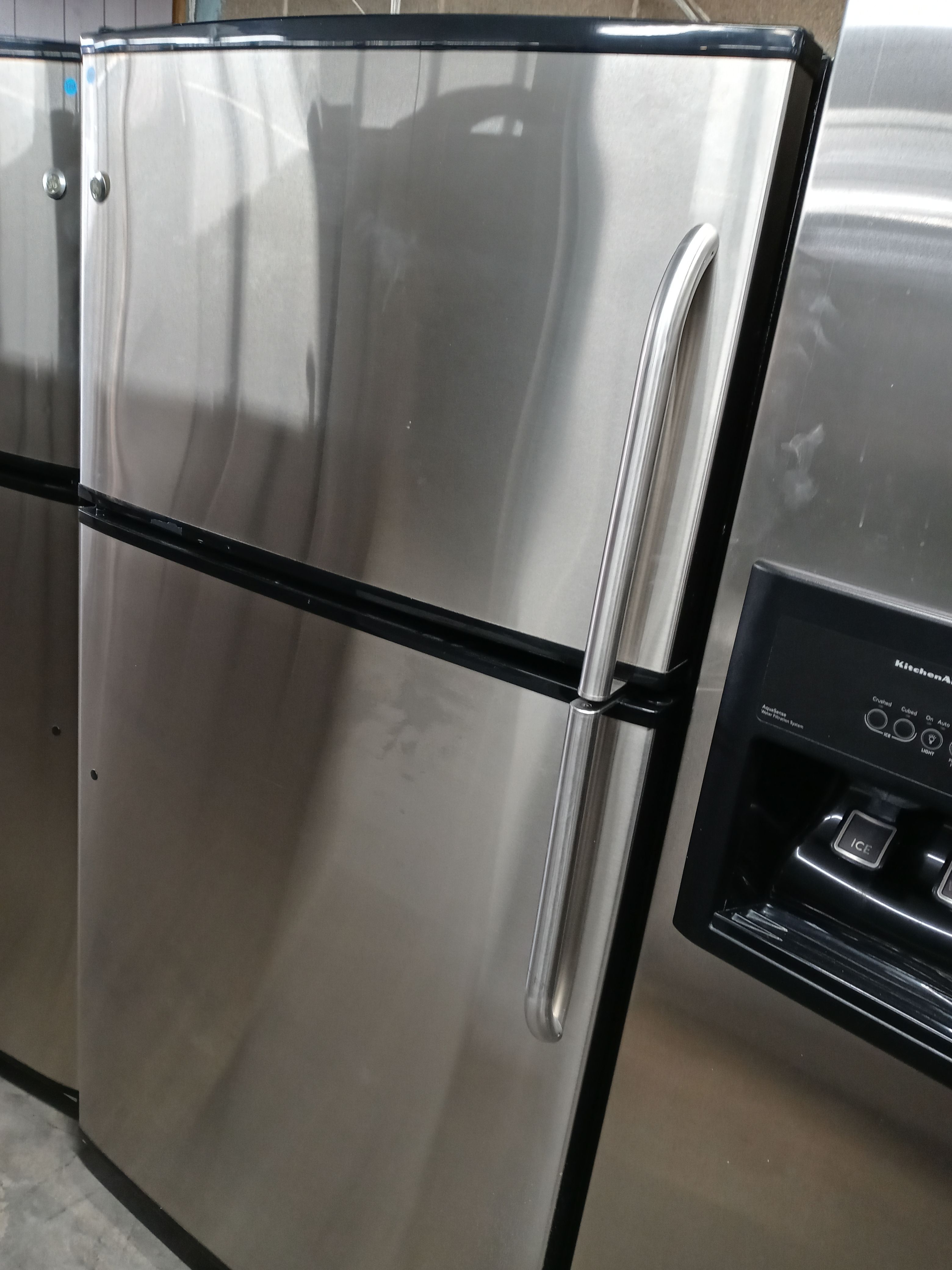 GE stainless steel top freezer refrigerator - Free delivery