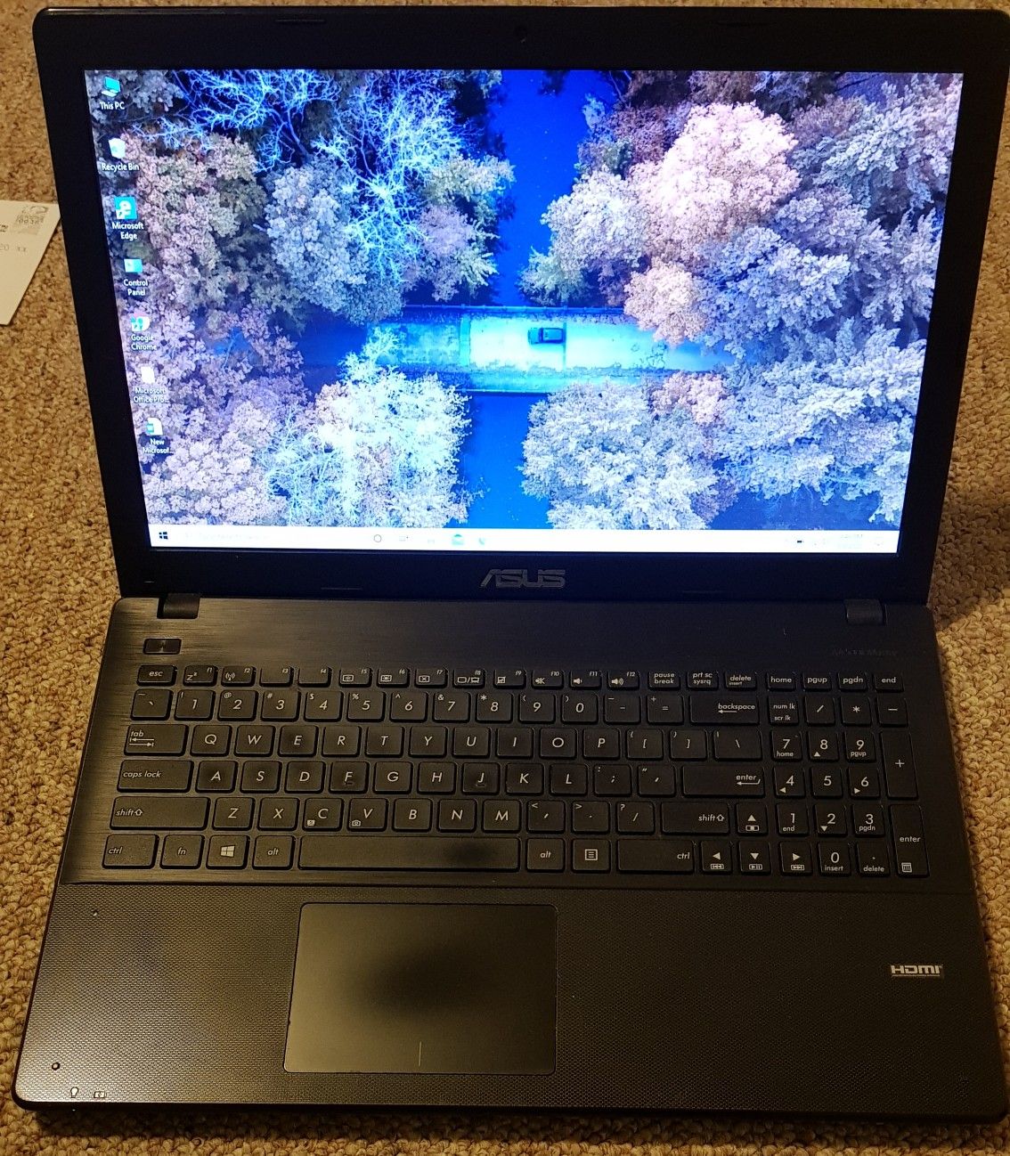 Asus X551m Laptop with 4GB Ram + new battery + Laptop Carrying Bag