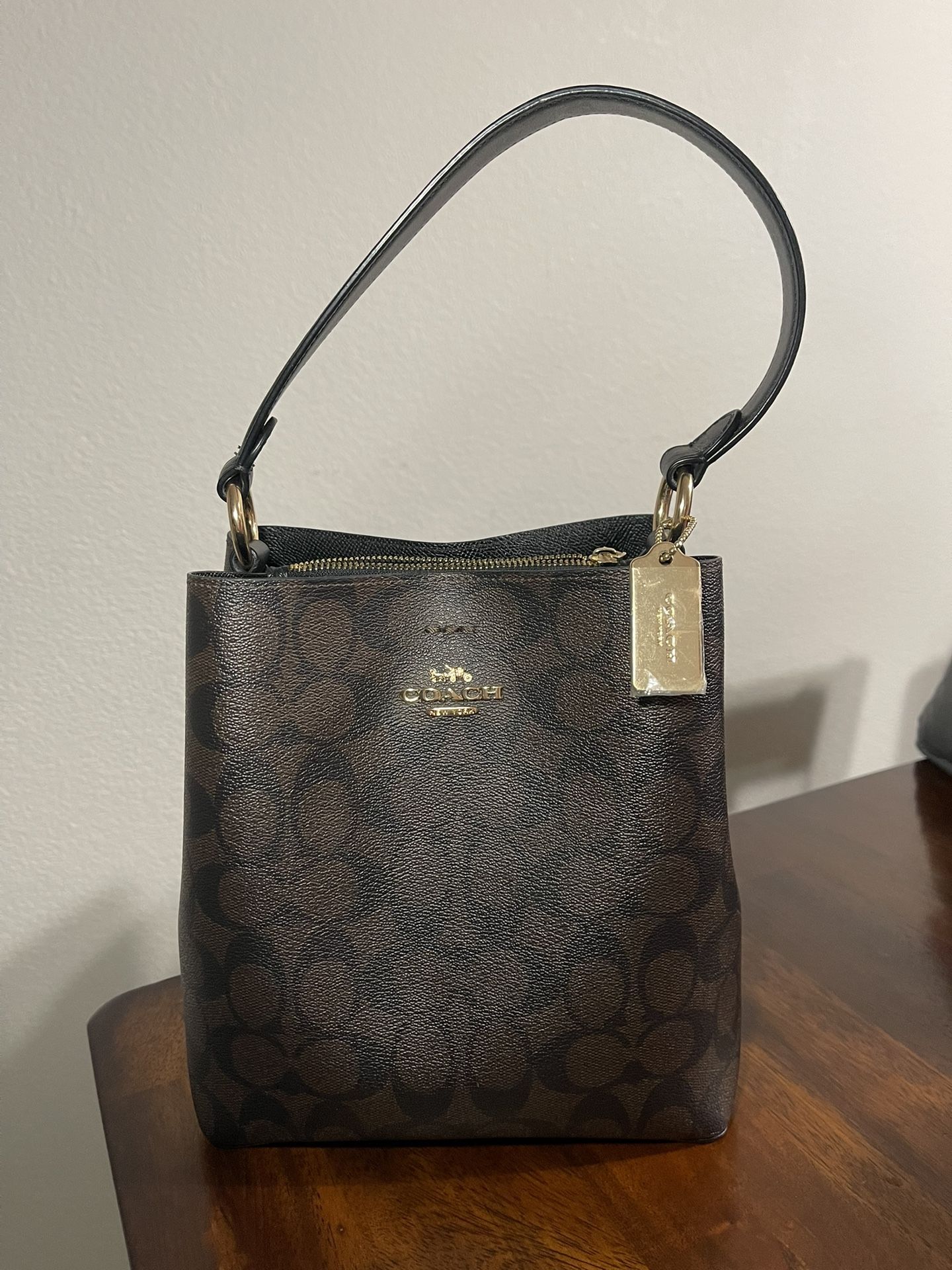 Signature Coach Bucket Bag