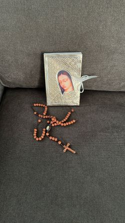 Guadalupe book and Rosary