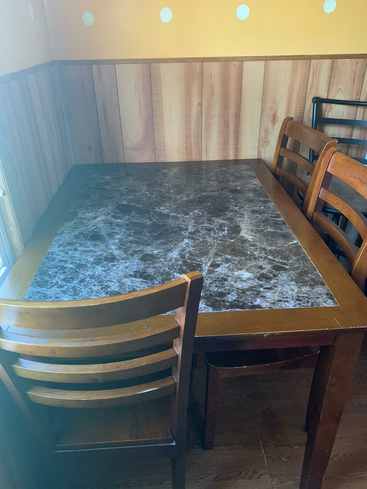 Table and 4 chairs wood good condition