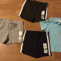 Nuevo Un Set De 4 Piesas 3 Shorts Y Una Camiseta De Nino 6-9 Meses