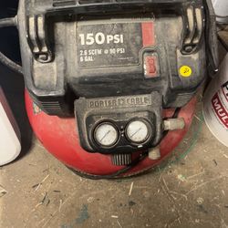 Porter-Cable 6-Gallon Portable 150 PSI Pancake Air Compressor (model C2002).
