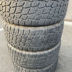 Nitto 295/60LT20 Grappler G2 tires ~ good tread ~ Load E ~ 10 ply AT   Tires are Nitto AT2 ~ Late 2020 DOT