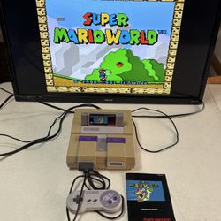 Super Nintendo SNS-001 console system with controller and game