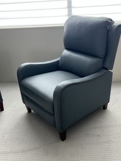 Brand new leather push back recliner, slate blue