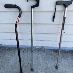 3 walking canes Sticks  $10 each or all three for 25