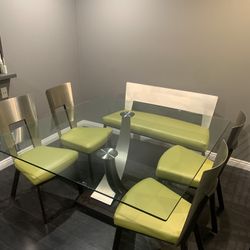 Home furniture table with four chairs and bench