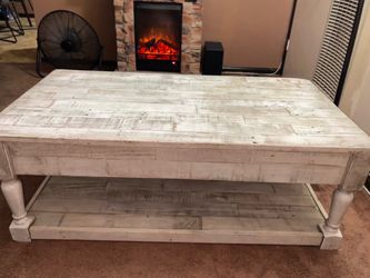 “Rustic farmhouse distressed” coffee table