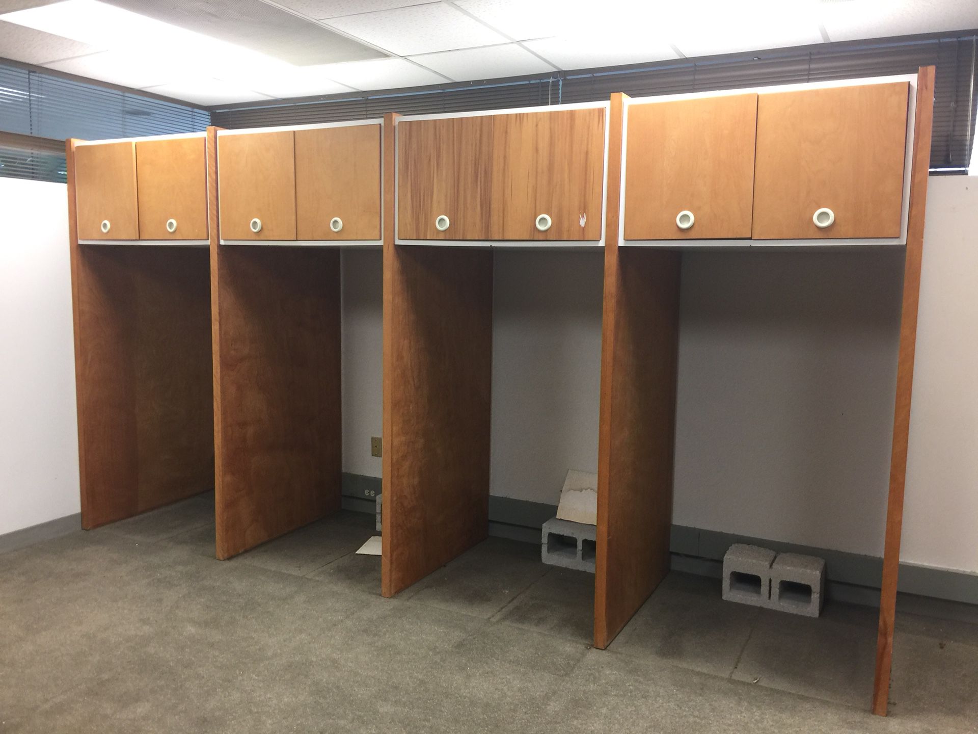 Four file cabinet surrounds. Metal cabinets no longer available. Could add a rod and use to hang clothes. Or use the solid wood ends to make tables.
