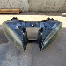 Used 08 r6 headlights.