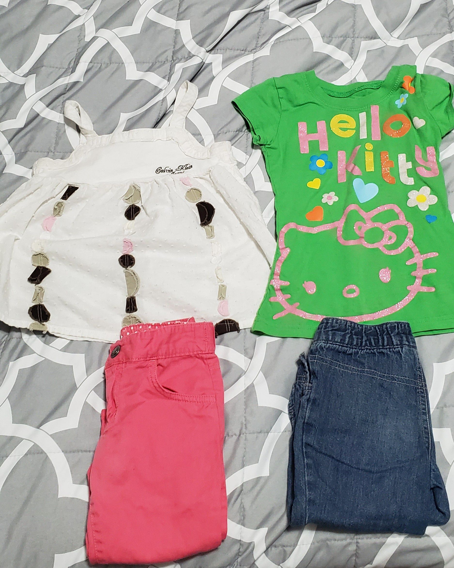 4 pieces of girls size 4 tops and capris