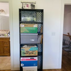 Bookcase/Shelf Unit. Dark brown. Very capacious. Excellent condition. Great bargain. Nice checkered pattern background. 71.25” tall. 24.75 x 11.50”.