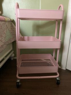 pink metal rolling cart
