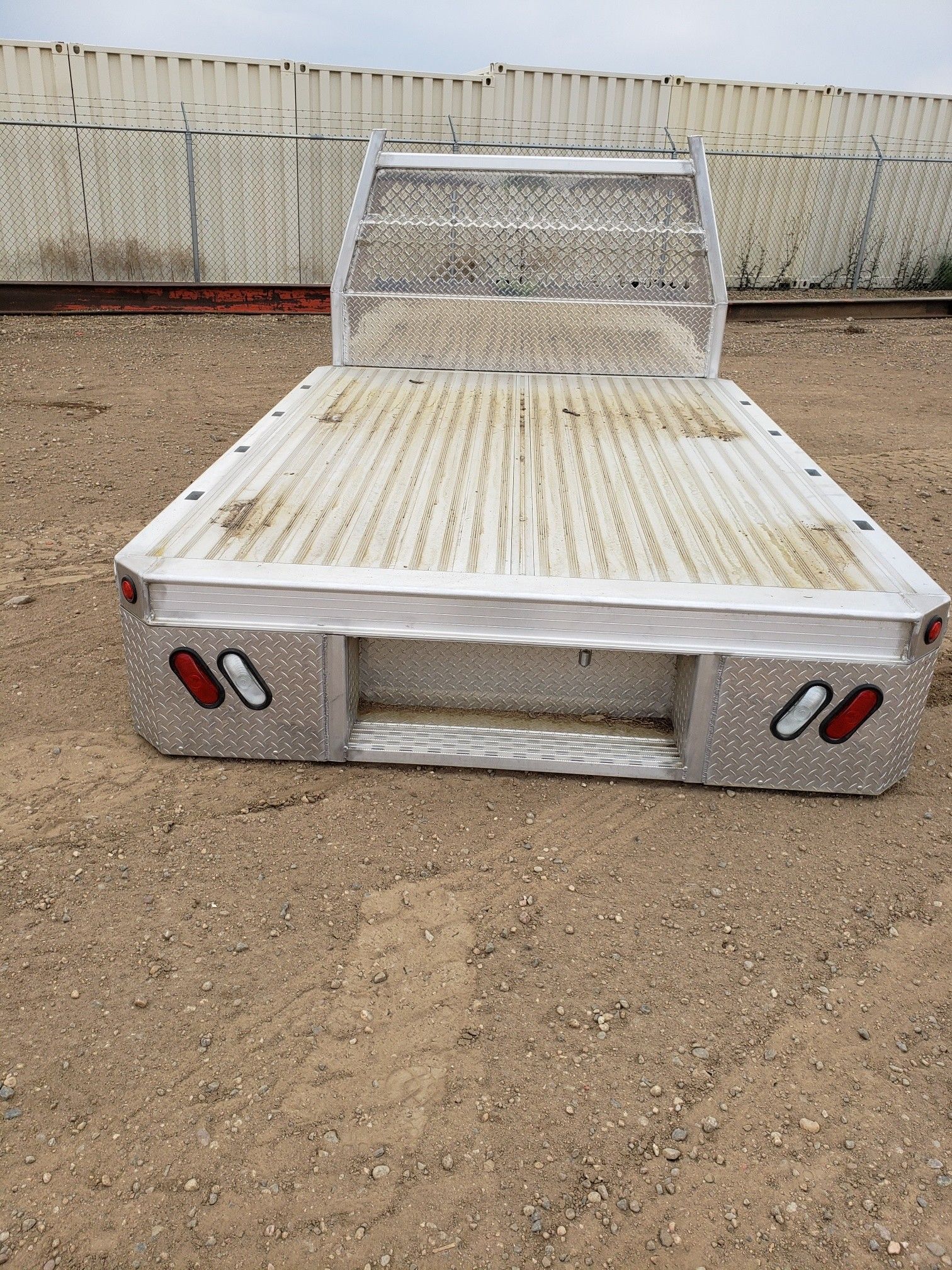 Alluminum flat bed with head ache rack and four side mount tools boxes